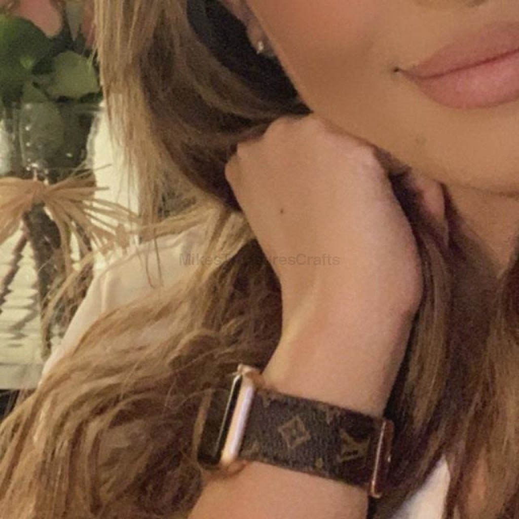Elegant Brown Apple Watch LV Band with Small, Chic Print