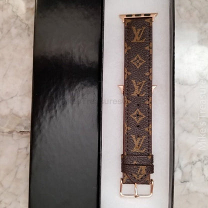 Elegant Brown Apple Watch LV Band with Small, Chic Print
